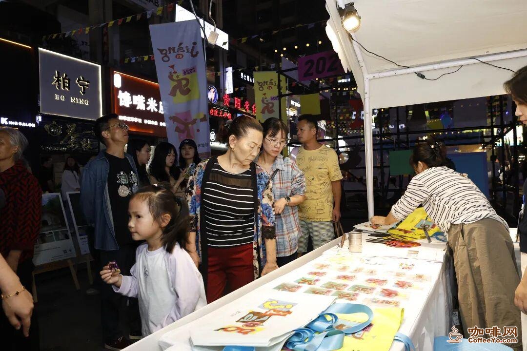 Families and friends strolling through the night market